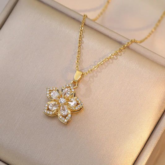 Gold-plated 316L stainless steel Eternal Bloom Rotatable Flower Necklace with zirconia centerpiece, front view.